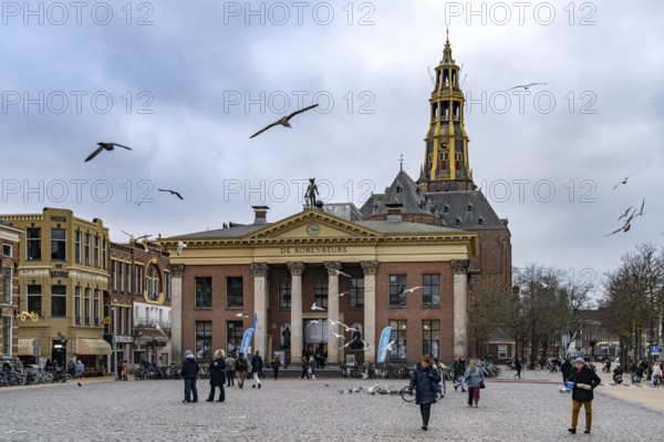 The Vismarkt fish market with the Korenbeurs former grain exchange and the steeple of the Aa church in Groningen, Netherlands