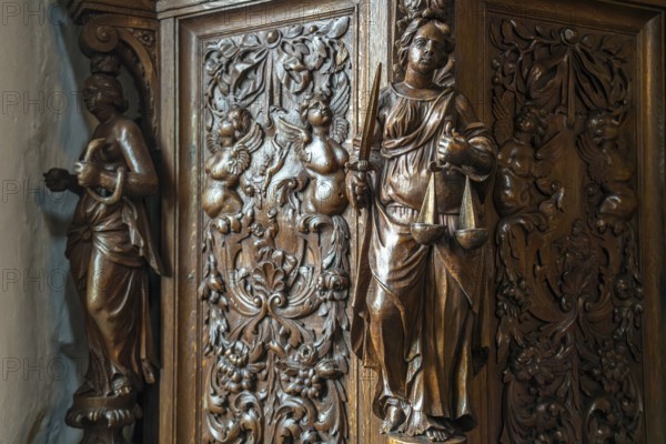 Detail of the wood-carved pulpit in the church of Midwolde, Groningen, Netherlands