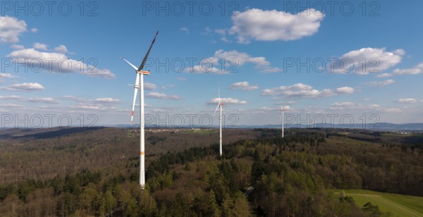 Wind turbines in a wooded area under a blue sky, maintenance work, repair, near Schorndorf im Remstal, Baden-Württemberg, Germany