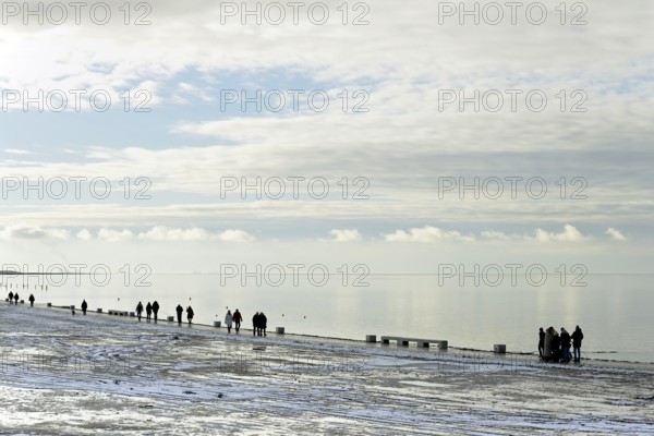 North Sea coast, view to the beach promenade of Norddeich, Wadden Sea with rising water and calm wind, North Sea, Lower Saxony, Germany