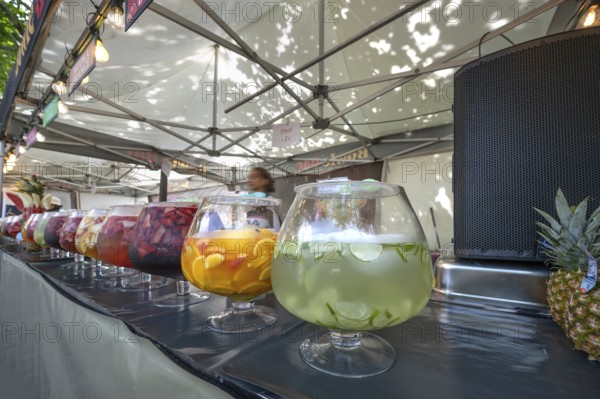 Large glasses filled with punch, market stall at the city festival, Nuremberg, Middle Franconia, Bavaria, Germany
