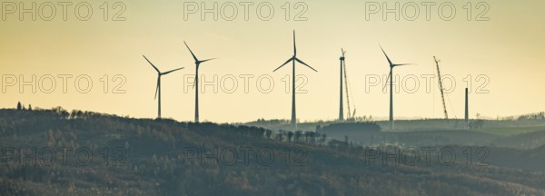 Aerial photo, wind turbines and construction site for a new wind turbine in the Riesenhagen forest area at Iserlohner Postweg and Eisenweg in Neuenrade, Sauerland, North Rhine-Westphalia, Germany, construction work, construction area, construction site, construction project, construction site, DE, Europe, aerial photo, aerial photography, aerial photography, new construction, Neuenrade, overview, bird's eye view, WEA, wind energy, wind turbine, wind power, wind turbine, wind farm, wind turbines, birds-eyes view, overview