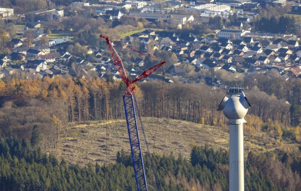 Aerial photo, wind turbines and construction site for a new wind turbine in the Riesenhagen forest area at Iserlohner Postweg and Eisenweg in Neuenrade, Sauerland, North Rhine-Westphalia, Germany, construction work, construction area, construction site, construction project, construction site, DE, Europe, aerial photo, aerial photography, aerial photography, new construction, Neuenrade, overview, bird's eye view, WEA, wind energy, wind turbine, wind power, wind turbine, wind farm, wind turbines, birds-eyes view, overview