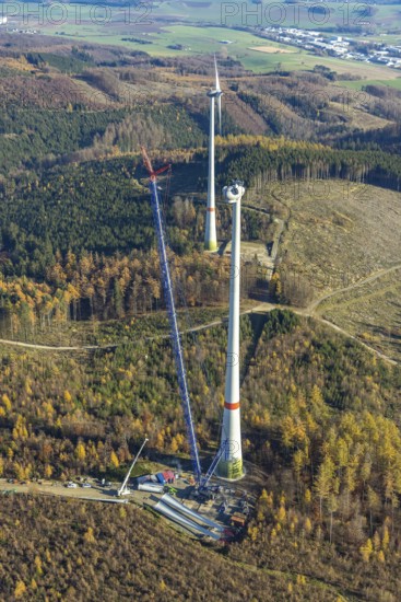 Aerial photo, wind turbines and construction site for a new wind turbine in the Riesenhagen forest area at Iserlohner Postweg and Eisenweg in Neuenrade, Sauerland, North Rhine-Westphalia, Germany, construction work, construction area, construction site, construction project, construction site, DE, Europe, aerial photo, aerial photography, aerial photography, new construction, Neuenrade, overview, bird's eye view, WEA, wind energy, wind turbine, wind power, wind turbine, wind farm, wind turbines, birds-eyes view, overview