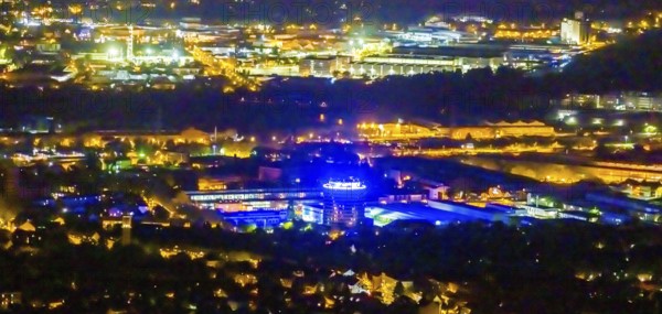 Aerial view, Geneba Industrial Park, Siemens tower office with blue lighting, Altstadt II, Mülheim an der Ruhr, Ruhr area, North Rhine-Westphalia, Germany, DE, twilight photography, Europe, commercial enterprises, commercial area, commercial area, commercial location, commercial use, industrial area, industrial location, light pollution, aerial photography, aerial photography, aerial photography, night, night photography, night flight, tower, tower Genebau Bau 20, overview, bird's eye view, illuminated streets, birds-eyes view, nightflight, overview