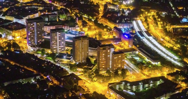 Aerial view, Mülheim an der Ruhr main station, Technical Town Hall and Forum City Mülheim shopping centre Hans-Böckler-Platz, Altstadt II, Mülheim an der Ruhr, Ruhr area, North Rhine-Westphalia, Germany, railway station, authority, DE, Deutsche Bahn AG, twilight photography, shopping centre, shopping square, shopping centre, Europe, central station, skyscrapers, light pollution, aerial view, aerial photography, aerial photography, night, night shot, night flight, fast cycle route, town hall, shopping, shopping centre, overview, bird's-eye view, illuminated streets, birds-eyes view, nightflight, overview