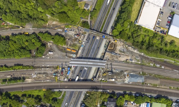 Aerial view, construction site after bridge fire motorway 40, renovation of railway bridges, Styrum, Mülheim an der Ruhr, Ruhr area, North Rhine-Westphalia, Germany, motorway A40, construction work, construction area, construction site, construction crane, construction measure, construction site, bridge, DE, railway bridge, renovation, Europe, aerial view, aerial photography, aerial photography, renovation, closure, tanker accident, overview, bird's eye view, bird's eye view, overview