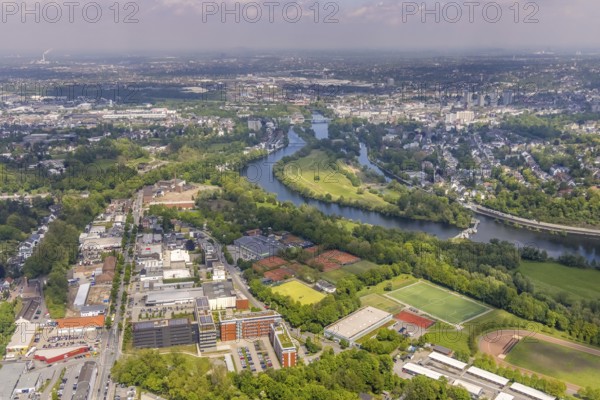 Aerial view, ALDI International Services GmbH company campus, RWW Kahlenberg hydroelectric power station, Ruhrinsel, Saarner Ruhraue sports park, Saarn, Mülheim an der Ruhr, Ruhr area, North Rhine-Westphalia, Germany, Aldi Süd, DE, Europe, football pitch, football stadium, commercial enterprises, commercial area, commercial site, commercial use, industrial area, industrial building, industrial site, aerial view, aerial photography, aerial photography, Mintarder Straße, photovoltaic, photovoltaic system, solar, solar system, solar energy, solar energy, sports, sports facilities, sports field, sports facility, tennis, tennis facility, tennis courts, overview, bird's-eye view, overview