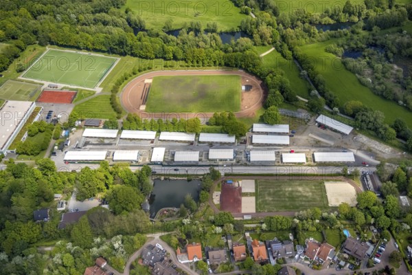 Aerial photo, refugee village Saarn Mintarder Straße and sports field, Saarn, Mülheim an der Ruhr, Ruhr area, North Rhine-Westphalia, Germany, asylum, DE, Europe, refugees, refugee homes, refugee accommodation, aerial photograph, aerial photography, aerial photography, overview, bird's-eye view, bird's-eye view, overview