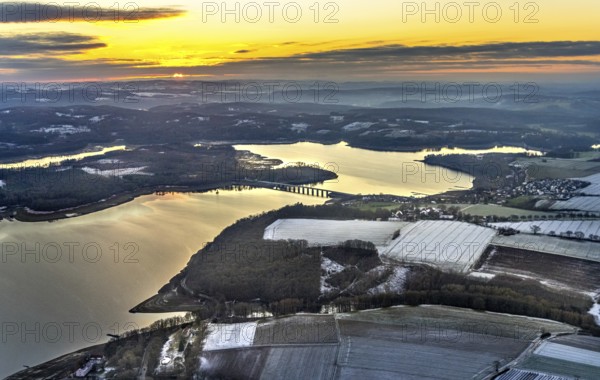 Aerial view of Lake Möhnesee in winter with snow and reflections of clouds on the water surface at low tide in Körbecke in Möhnesee in Sauerland in North Rhine-Westphalia, Germany, Möhnesee, Sauerland, North Rhine-Westphalia, DE, Europe, aerial photo, birds-eyes view, aerial photography, aerial photography, overview, bird's eye view