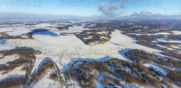 Aerial view, forest area Südlicher Randweg and Möhnesee, Brüningsen, Möhnesee, Sauerland, North Rhine-Westphalia, Germany, mountains and valleys, DE, Europe, distant view, hilly landscape, aerial view, aerial photography, aerial photography, cracks in the ice, snow, overview, bird's eye view, winter at Möhnesee, winter landscape, birds-eyes view, overview