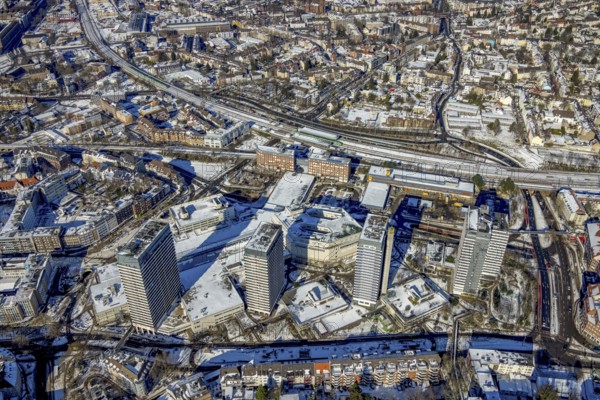 Aerial view, Dickswall high-rise buildings, railway station, Altstadt I - Südost, Mülheim an der Ruhr, Ruhr area, North Rhine-Westphalia, Germany, railway tracks, DE, Deutsche Bahn AG, Europe, railway tracks, central station, main station, high-rise buildings, aerial view, aerial photography, aerial photography, RS1, cycle path, snow, overview, bird's-eye view, winter, birds-eyes view, overview