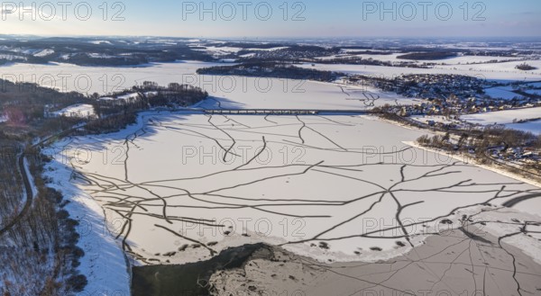Aerial view, Möhnesee and Delecker Bridge, Delecke, Möhnesee, Sauerland, North Rhine-Westphalia, Germany, Arnsberger Straße, bridge, DE, Europe, distant view, aerial view, aerial photography, aerial photography, cracks in the ice, snow, overview, bird's eye view, winter at Möhnesee, winter landscape, birds-eyes view, overview