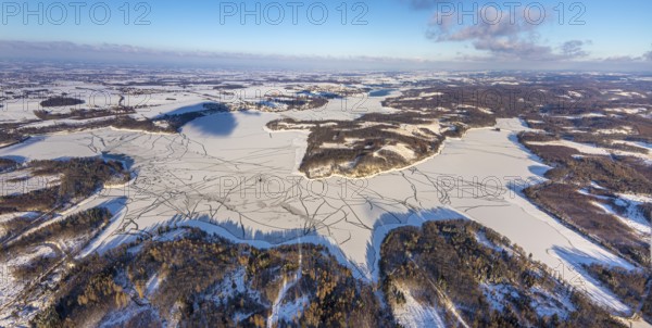 Aerial view, forest area Südlicher Randweg and Möhnesee, Brüningsen, Möhnesee, Sauerland, North Rhine-Westphalia, Germany, mountains and valleys, DE, Europe, distant view, hilly landscape, aerial view, aerial photography, aerial photography, cracks in the ice, snow, overview, bird's eye view, winter at Möhnesee, winter landscape, birds-eyes view, overview
