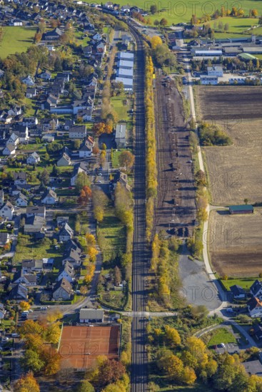 Aerial view, sawmill timber yard at the railway embankment in the district Wennemen in Meschede, Sauerland, North Rhine-Westphalia, Germany, DE, Europe, Im Ruhr Valley, aerial view, aerial photography, aerial photography, Meschede, sawmill Hüster, overview, bird's eye view, birds-eyes view, overview