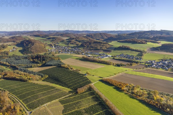 Aerial view, meadows and fields with St. Severinus parish church in the district of Calle in Meschede, Sauerland, North Rhine-Westphalia, Germany, place of worship, DE, Europe, religious community, place of worship, sacred site, hilly landscape, church, parish, denomination, aerial view, aerial photography, aerial photography, Meschede, religion, religious site, overview, bird's-eye view, meadows and fields, birds-eyes view, overview
