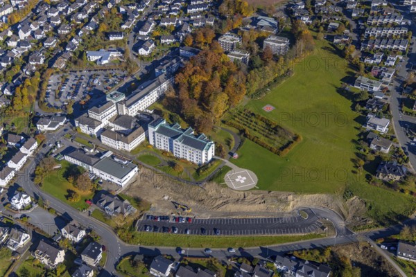 Aerial view, construction area at St. Walburga-Krankenhaus Meschede in Meschede-Stadt in Meschede, Sauerland, North Rhine-Westphalia, Germany, construction work, construction area, building site, building plots, construction project, construction site, DE, Europe, healthcare, hospital, helipad, clinic, clinic centre, hospital, aerial photograph, aerial photography, aerial photography, medical facility, medical aid, Meschede, overview, bird's eye view, birds-eyes view, overview, medical care