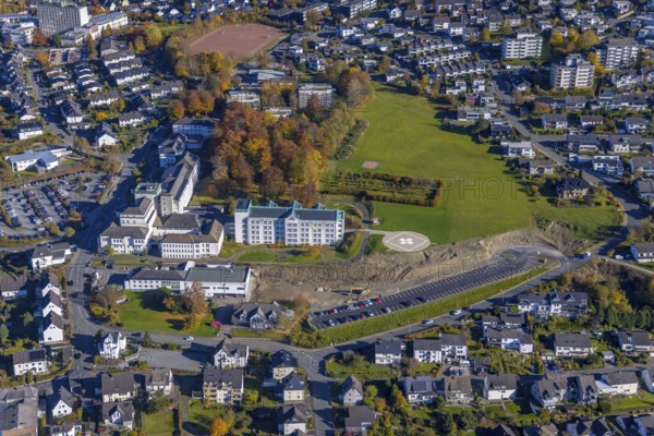 Aerial view, construction area at St. Walburga-Krankenhaus Meschede in Meschede-Stadt in Meschede, Sauerland, North Rhine-Westphalia, Germany, construction work, construction area, building site, building plots, construction project, construction site, DE, Europe, healthcare, hospital, helipad, clinic, clinic centre, hospital, aerial photograph, aerial photography, aerial photography, medical facility, medical aid, Meschede, overview, bird's eye view, birds-eyes view, overview, medical care