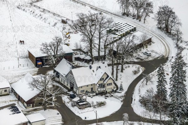 Aerial view of the winter landscape in Mosebolle with riding stable near Meschede in winter with snow in the Sauerland in North Rhine-Westphalia, Germany, Meschede, Sauerland, North Rhine-Westphalia, DE, Europe, aerial photo, birds-eyes view, aerial photography, aerial photography, overview, bird's eye view
