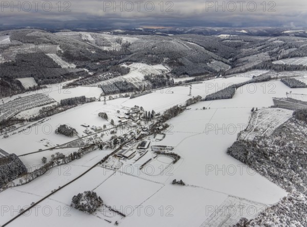 Aerial view of the winter landscape in Mosebolle with riding stable near Meschede in winter with snow in the Sauerland in North Rhine-Westphalia, Germany, Meschede, Sauerland, North Rhine-Westphalia, DE, Europe, aerial photo, birds-eyes view, aerial photography, aerial photography, overview, bird's eye view