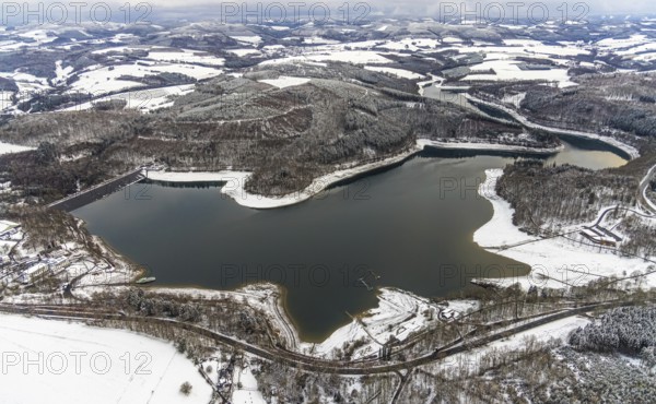 Aerial view of the Hennesee at low water near Meschede in winter with snow in the Sauerland in North Rhine-Westphalia, Germany, Meschede, Sauerland, North Rhine-Westphalia, DE, Europe, aerial photo, birds-eyes view, aerial photography, aerial photography, overview, overview, bird's eye view