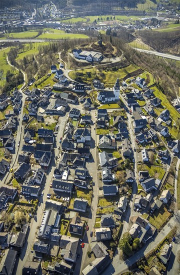 Aerial view, View of Eversberg, Ruins of Eversberg Castle, Schlossberghalle Eversberg, St.-Johannes-Evangelist-Kirche, Eversberg, Meschede, Sauerland, North Rhine-Westphalia, Germany, place of worship, castle, DE, Europe, religious community, place of worship, sacred site, church, parish, denomination, aerial view, aerial photography, aerial photography, religion, religious site, castle, castle hill, shooting hall, overview, bird's-eye view, birds-eyes view, overview