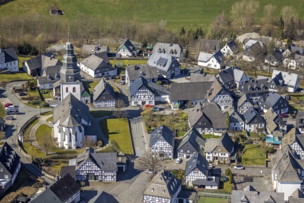 Aerial view, St.-Johannes-Evangelist-Church and half-timbered houses, Eversberg, Meschede, Sauerland, North Rhine-Westphalia, Germany, DE, Europe, half-timbered houses, property tax, real estate, aerial view, aerial photography, aerial photography, overview, bird's-eye view, housing estate, living and life, residential area, residential houses, quality of life, residential neighbourhood, housing estate, birds-eyes view, overview