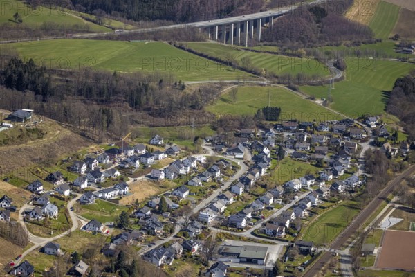Aerial view, construction site, residential area Vor dem Holzborn, Wehrstapel, Meschede, Sauerland, North Rhine-Westphalia, Germany, motorway A46, construction work, construction area, construction site, building plots, construction crane, construction project, construction site, bridge, DE, Europe, aerial view, aerial photography, aerial photography, viaduct, overview, bird's eye view, birds-eyes view, overview