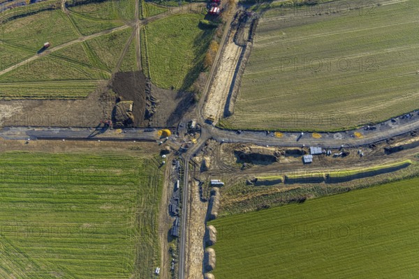 Aerial view, construction site at the Hämmerstraße in the industrial park Hämmer in the district Holzen in Menden, Sauerland, North Rhine-Westphalia, Germany, construction work, construction area, building site, building plots, construction measure, construction project, construction site, DE, Europe, commercial enterprises, commercial area, commercial park, commercial site, commercial use, industrial area, industrial building, industrial site, aerial view, aerial photography, aerial photography, Menden, overview, bird's eye view, bird's eye view, bird's eye view, overview