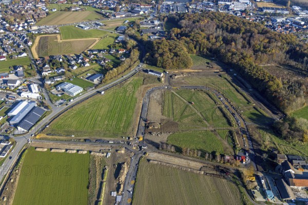 Aerial view, construction site at the Hämmerstraße in the industrial park Hämmer in the district Holzen in Menden, Sauerland, North Rhine-Westphalia, Germany, construction work, construction area, building site, building plots, construction measure, construction project, construction site, DE, Europe, commercial enterprises, commercial area, commercial park, commercial site, commercial use, industrial area, industrial building, industrial site, aerial view, aerial photography, aerial photography, Menden, overview, bird's eye view, bird's eye view, bird's eye view, overview