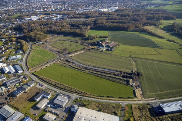 Aerial view, construction site at the Hämmerstraße in the industrial park Hämmer in the district Holzen in Menden, Sauerland, North Rhine-Westphalia, Germany, construction work, construction area, building site, building plots, construction measure, construction project, construction site, DE, Europe, commercial enterprises, commercial area, commercial park, commercial site, commercial use, industrial area, industrial building, industrial site, aerial view, aerial photography, aerial photography, Menden, overview, bird's eye view, bird's eye view, bird's eye view, overview