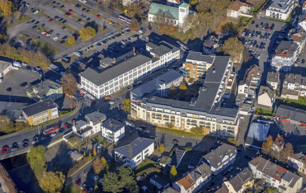 Aerial view, Hansa Seniorenwohnpark Menden as well as parish church St. Walburgis and Education Centre of Commerce in Menden, Sauerland, North Rhine-Westphalia, Germany, 2 bridges over the Weser, old people's home, retirement home, old people's home, place of worship, care and nursing, education, DE, Europe, religious community, place of worship, holy place, church, parish, denomination, aerial view, aerial photography, aerial photography, Menden, care facility, religion, religious site, retirement home, retirement residence, retirement home, retirement centre, overview, bird's eye view, Walburgiskirche, birds-eyes view, overview