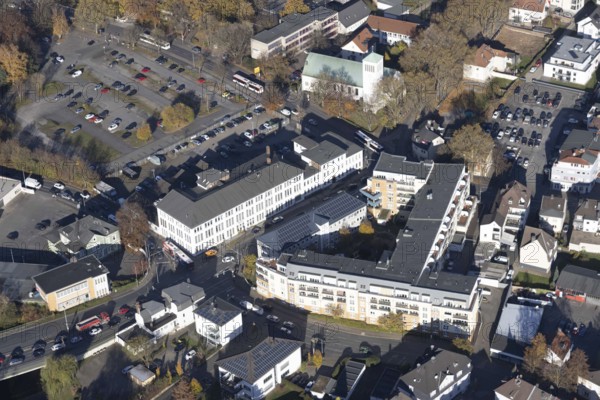 Aerial view, Hansa Seniorenwohnpark Menden as well as parish church St. Walburgis and Education Centre of Commerce in Menden, Sauerland, North Rhine-Westphalia, Germany, 2 bridges over the Weser, old people's home, retirement home, old people's home, place of worship, care and nursing, education, DE, Europe, religious community, place of worship, holy place, church, parish, denomination, aerial view, aerial photography, aerial photography, Menden, care facility, religion, religious site, retirement home, retirement residence, retirement home, retirement centre, overview, bird's eye view, Walburgiskirche, birds-eyes view, overview