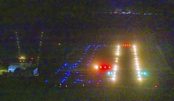 Aerial photo, Marl Loemühle airfield, night approach to the runway with PAPI, runway lighting, commercial airfield, Speckhorn, Recklinghausen, Ruhr area, North Rhine-Westphalia, Germany, DE, twilight photography, Europe, flight emission, aircraft noise, airfield, shapes and colours, light pollution, aerial photography, aerial photography, night, night photography, night flight, overview, bird's-eye view, illuminated roads, birds-eyes view, nightflight, overview