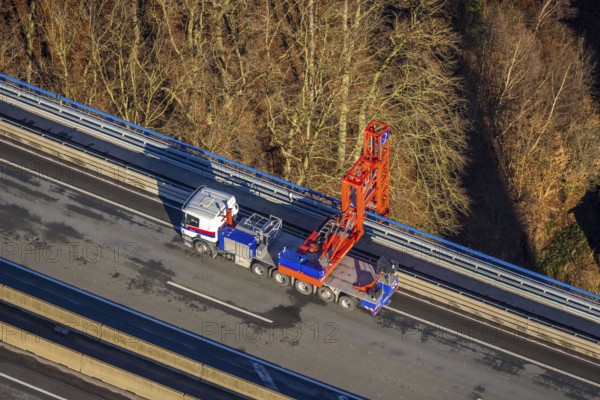 Aerial photo, construction measure with emergency reinforcement for Rahmede viaduct on the A45 Sauerlandlinie motorway in the Gevelndorf district of Lüdenscheid, Sauerland, North Rhine-Westphalia, Germany, A45, construction work, construction measure, construction site, DE, Europe, aerial photo, aerial photography, aerial photography, Lüdenscheid, emergency reinforcement, through road, Rahmede viaduct, Sauerland line, closure of Rahmede viaduct, traffic jam, traffic jam, overview, traffic chaos, traffic infrastructure, traffic jam, bird's-eye view, lack of load-bearing capacity, dilapidated bridge, dilapidated bridges, overview