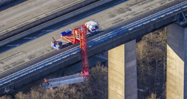 Aerial photo, construction measure with emergency reinforcement for Rahmede viaduct on the A45 Sauerlandlinie motorway in the Gevelndorf district of Lüdenscheid, Sauerland, North Rhine-Westphalia, Germany, A45, construction work, construction measure, construction site, DE, Europe, aerial photo, aerial photography, aerial photography, Lüdenscheid, emergency reinforcement, through road, Rahmede viaduct, Sauerland line, closure of Rahmede viaduct, traffic jam, traffic jam, overview, traffic chaos, traffic infrastructure, traffic jam, bird's-eye view, lack of load-bearing capacity, dilapidated bridge, dilapidated bridges, overview