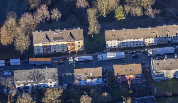 Aerial view, through road with truck traffic jam on the Lennestraße at the exit Lüdenscheid of the motorway A45 Sauerlandlinie because of the closed viaduct Rahmede in the district Leifringhausen in Lüdenscheid, Sauerland, North Rhine-Westphalia, Germany, A45, motorway junction, DE, Europe, truck traffic jam, aerial view, aerial photography, aerial photography, Lüdenscheid, through road, Sauerlandlinie, closure of the Rahmede viaduct, traffic jam, traffic jam, road traffic, overview, diversion, traffic volume, traffic chaos, traffic infrastructure, traffic jam, bird's eye view, birds-eyes view, dilapidated bridge, dilapidated bridges, overview