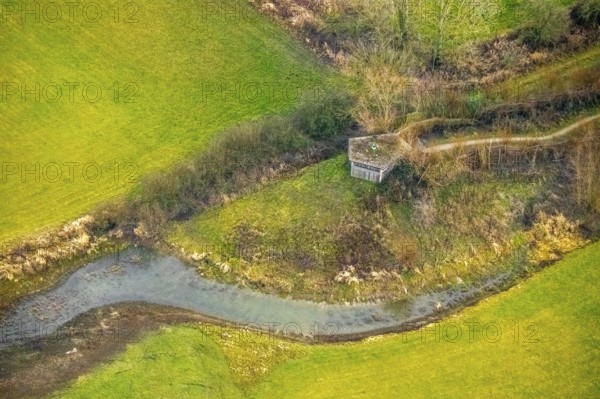 Aerial view of the national nature reserve Lippeauen at the river Lippe with the observation hut Disselmersch near Heintrop in Lippetal in North Rhine-Westphalia, Germany. Geese fly over the river Lippe, Lippetal, Ruhr area, North Rhine-Westphalia, Germany, DE, Europe, aerial photograph, birds-eyes view, aerial photography, aerial photography, overview, bird's eye view