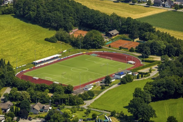 Aerial view, sports field at the Habuche, Grevenbrück, Lennestadt, Sauerland, North Rhine-Westphalia, Germany, DEU, Europe, football pitch, football stadium, hilly landscape, athletics stadium, aerial view, aerial photography, aerial photography, sports, sports facilities, sports field, sports facility, tennis, tennis facility, tennis courts, overview, bird's-eye view, bird's-eye view, overview