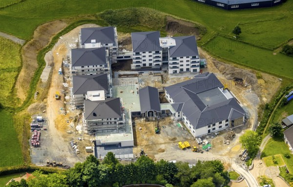 Aerial view, new senior-friendly residential complex WohnGut, Saalhausen, Lennestadt, Sauerland, North Rhine-Westphalia, Germany, retirement home, old people's home, construction work, construction area, building site, building plots, construction project, construction site, care and nursing, DEU, Europe, aerial view, aerial photography, aerial photography, new construction, care facility, retirement home, retirement home, retirement home, senior citizens' centre, overview, bird's eye view, bird's eye view, overview