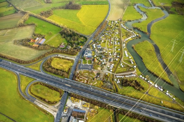 Aerial view of the planned industrial area Westfalen Hamm/Lippetal east of the Hamm-Uentrop junction on the A2 motorway in Lippborg in Lippetal in North Rhine-Westphalia, Germany. The campsite Uentrop Helbach GmbH is located at the river Lippe and the motorway A2, Lippetal, Ruhr area, North Rhine-Westphalia, Germany, DE, Europe, aerial view, birds-eyes view, aerial photography, aerial photography, overview, overview, bird's eye view