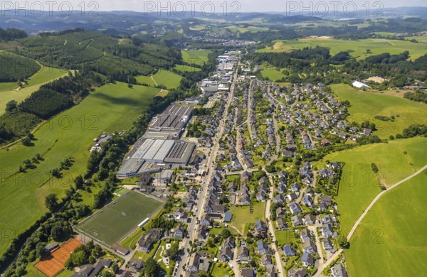 Aerial view, aerial view Elspe with commercial area Bielefelder Straße and sports field Elspe, Lennestadt, Sauerland, North Rhine-Westphalia, Germany, DEU, Europe, football pitch, football stadium, commercial enterprises, commercial area, commercial park, commercial location, commercial use, industrial area, industrial building, industrial location, aerial view, aerial photography, aerial photography, sports, sports facilities, sports field, sports facility, overview, bird's eye view, birds-eyes view, overview