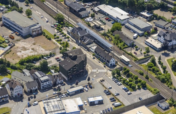 Aerial view, Lennestadt-Grevenbrück railway station, EssBahnhof and KulturBahnhof, brownfield site at the forecourt, Lennestadt, Sauerland, North Rhine-Westphalia, Germany, railway station, station forecourt, building site, building plots, DEU, Deutsche Bahn AG, Europe, gastronomy, main station, main station, culture, art, aerial view, aerial photography, aerial photography, restaurant, overview, event location, bird's-eye view, birds-eyes view, cultural use, overview
