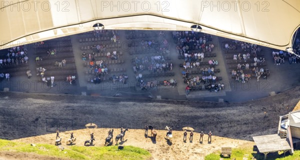 Aerial view, Elspe festival area, horse parade, spectators under the tent roof, Niedermelbecke, Lennestadt, Sauerland, North Rhine-Westphalia, Germany, DE, DEU, Europe, Karl May Festival, culture, art, aerial photography, aerial photography, aerial photography, overview, entertainment, events, venue, event location, bird's-eye view, tent roof, spectators, birds-eyes view, cultural use, overview