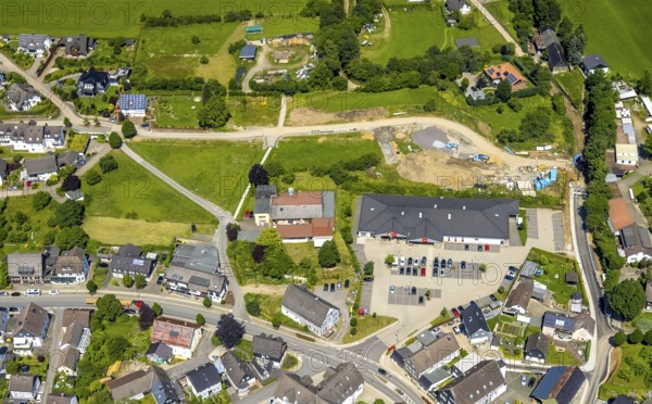 Aerial view, Penny supermarket and construction site Seilmecke in Elspe, Lennestadt, Sauerland, North Rhine-Westphalia, Germany, construction work, construction area, building site, building plots, construction project, construction site, DEU, Europe, aerial view, aerial photography, aerial photography, overview, bird's-eye view, overview
