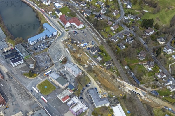 Aerial view, construction site and replacement construction of the DB bridge and new road construction B517, Eichen district, Kreuztal, Sauerland, North Rhine-Westphalia, Germany, construction work, construction site, building site, building plots, construction project, construction site, bridge, DE, Europe, Hagener Straße, Siegen-Wittgenstein district, aerial photograph, aerial photography, aerial photography, new construction, overview, bird's-eye view, overview, thyssenkrupp Stahlkontor Zweigniederlassung der thyssenkrupp Schulte GmbH