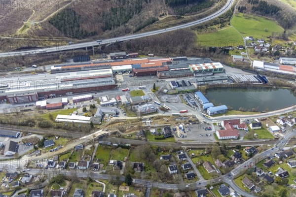 Aerial view, construction site and replacement construction of the DB bridge and new road construction B517, Eichen district, Kreuztal, Sauerland, North Rhine-Westphalia, Germany, construction work, construction site, building site, building plots, construction project, construction site, bridge, DE, Europe, Hagener Straße, Siegen-Wittgenstein district, aerial photograph, aerial photography, aerial photography, new construction, overview, bird's-eye view, overview, thyssenkrupp Stahlkontor Zweigniederlassung der thyssenkrupp Schulte GmbH