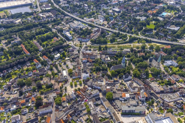Aerial view, city centre with Alter Markt and catholic parish church Zur Heiligen Familie and evang. Pauluskirche, Sesekepark between Maibrücke and Hochstraße with river Seseke in Kamen, Ruhr area, North Rhine-Westphalia, Germany, place of worship, federal road B233, City, DE, Europe, religious community, place of worship, holy place, city centre, Kamen, church, parish, denomination, aerial view, aerial photography, aerial photography, market place, town view, park, religion, religious site, townscape, urban area, city centre, overview, bird's-eye view, overview