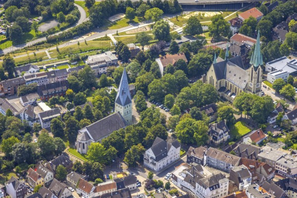 Aerial view, city centre with catholic parish church Zur Heiligen Familie and protestant church Pauluskirche in Kamen, Ruhr area, North Rhine-Westphalia, Germany, place of worship, city, DE, Europe, religious community, place of worship, holy place, city centre, Kamen, church, parish, denomination, aerial view, aerial photography, aerial photography, market place, local view, religion, religious place, townscape, city area, city centre, overview, bird's eye view, birds-eyes view, overview