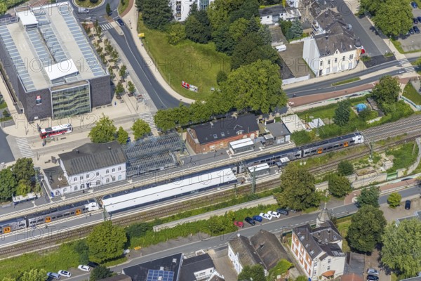 Aerial view, Kamen railway station with multi-storey car park in Kamen, Ruhr area, North Rhine-Westphalia, Germany, railway station, station forecourt, DE, Deutsche Bahn AG, Europe, railway tracks, main railway station, main station, Kamen, aerial view, aerial photography, aerial photography, multi-storey car park, overview, bird's-eye view, overview